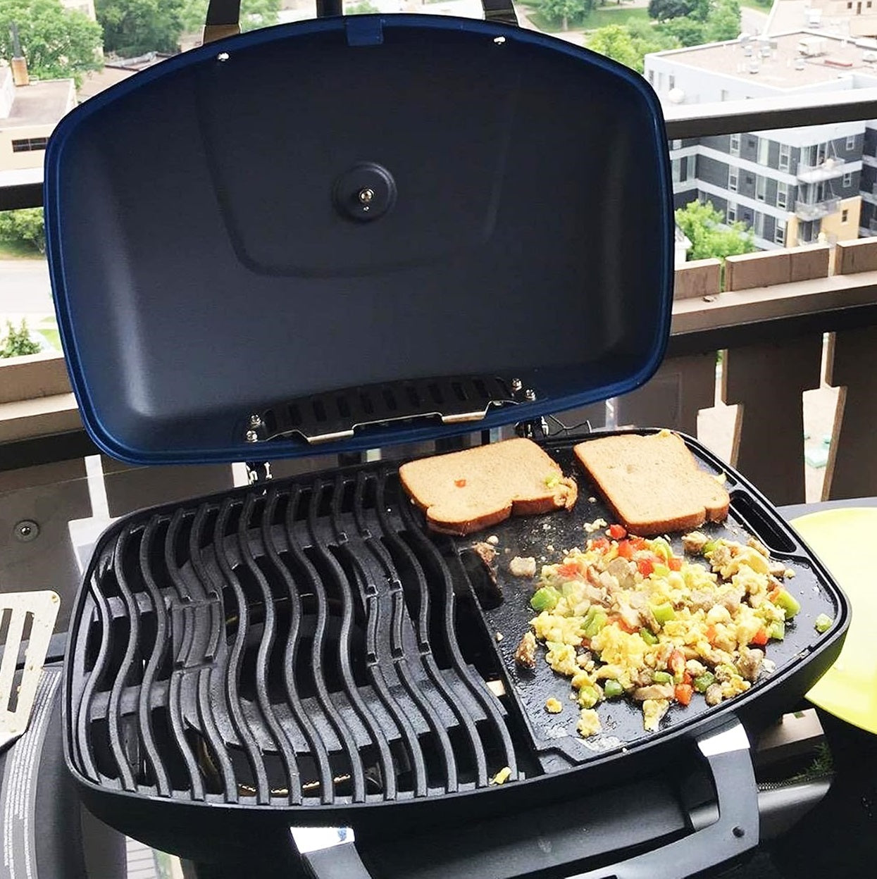 Napoleon Cast Iron Reversible Griddle for TravelQ 285 Series | BBQ Accessories NZ | Napoleon NZ | BBQ Accessories,cast iron griddle,Napoleon griddle,portable grill accessory,reversible griddle,TravelQ 285 griddle | Outdoor Concepts