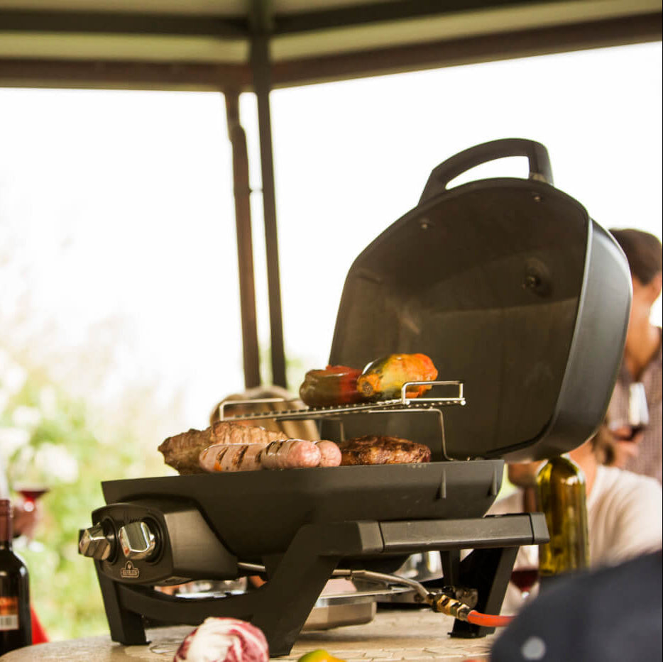 Napoleon TravelQ PRO285 Portable Gas Grill Black | BBQs NZ | Napoleon NZ | camping grill,cast iron cooking grids,Created by Product Upload,Napoleon TravelQ,portable gas grill,PRO285,propane barbecue,stainless steel burners,travel grill | Outdoor Concepts