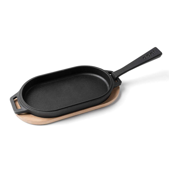 Ooni Cast Iron Sizzler Pan w/wooden Base | Accessories NZ | Ooni NZ | Accessories,cooking surface,Pizza Oven Accessories | Outdoor Concepts